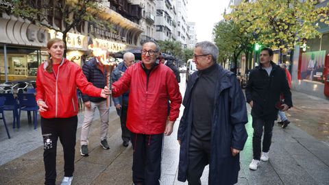 Recorrido de la antorcha olmpia por la calle del Paseo