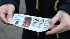 Participaci�n de loter�a de Navidad vendida por la comisi�n de fiestas de Villaman�n y premiada con el gordo