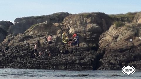 Momento del rescate del joven de 23 a�os