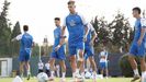 Sergio Escudero, Arnau Comas y Quique Teijo, en el entrenamiento de este domingo en M�laga