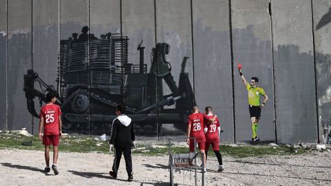 Grafiti en el muro en la ciudad de Bel�n que denuncia la expansi�n israel� por Cisjordania.