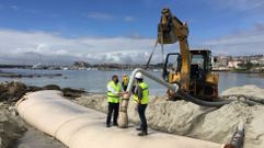 Sanxenxo estrena en Espa�a un sistema de contenci�n de arena en Carabuxeira