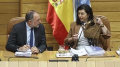 Elena Candia y Julio Garc�a Comesa�a, durante el �ltimo pleno en el Parlamento gallego.