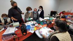 Taller de encaje en la sala del exposiciones del Puerto