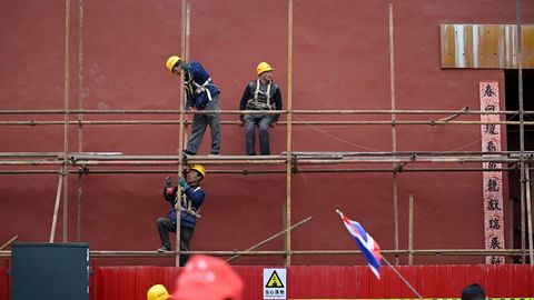 Trabajadores en una obra de Beijin 