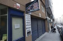 Local en el que se efectu� el registro, ayer con la persiana bajada. 