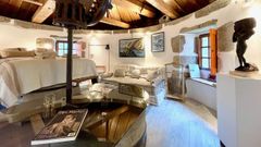 El molino rehabilitado por el pintor Secundino Rivera hace casi medio siglo, tras la �ltima reforma