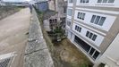 Lugar al que cay una joven trans desde la Muralla de Lugo, presuntamente empujada por un hombre