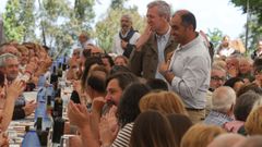 Romer�a del PP en Poio. Alfonso Rueda con el candidato de su partido a la alcald�a, �ngel Moldes