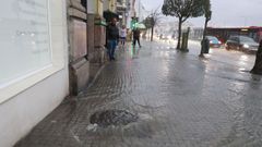 Imagen de archivo de una calle de la ciudad de A Coru�a en la que las fuertes lluvias provocan varias inundaciones en calles del centro de la urbe.
