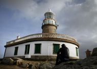 El faro de Corrubedo constituye  uno de los atractivos tur�sticos del municipio. 