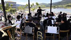 <span lang= gl >Imaxe dun concerto da Banda de M�sica O Landro no Templete dos Xard�ns Noriega Varela</span>