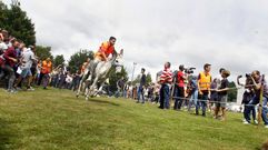 Los burros, los jinetes y el p�blico... la carrera de Escair�n en im�genes