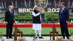 De izquierda a derecha, Vladimir Putin, presidente de Rusia; Narendra Modi, primer ministro indio; y Xi Jinping, presidente de China, en la cumbre de los BRICS en Nueva Deli.