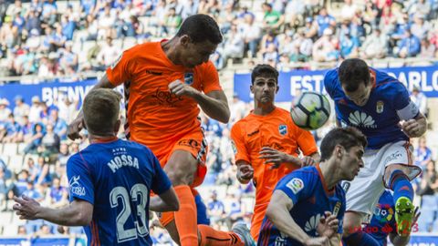 Mossa, Forln y Linares tratan de despejar un baln ante el Lorca