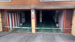 El garaje de la calle Laguna en el que este lunes por la tarde se registr� un incendio que oblig� a precintarlo