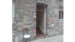 Portal de la vivienda donde se inici� el fuego