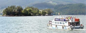 Imagen de archivo de un viaje mar�timo guiado para turistas a las islas de San Sim�n. 