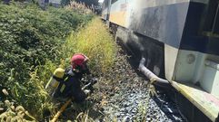 Incendio de un tren de v�a estrecha en Santa Cecilia