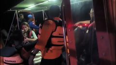 La valenciana Andrea Ortu�o, superviviente, madre y esposa de los desaparecidos, habla por tel�fono tras ser rescatada