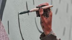 Un momento del pintado del mural