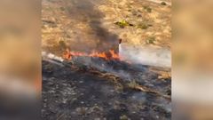 El helicóptero pilotado por Iván Majano en las labores de extinción del incendio de Aranjuez.