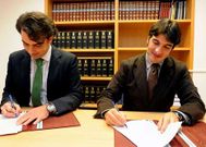 Calvo y Amor firmaron el convenio.