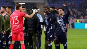 Los futbolistas del Celta, plet�ricos, tras eliminar el Lyon de la Europa League.