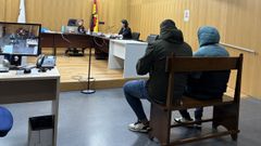 Los dos acusados, durante el juicio en Ourense