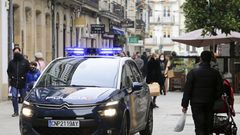 Un coche patrulla de la Polic�a Nacional en el centro de Lugo