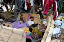 Inmigrantes en el centro de acogida de la isla de Lampedusa el pasado octubre.