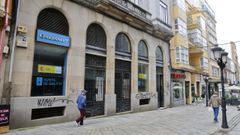 Pintadas en la fachada de Galer�as Ferrol