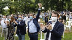 Feijoo, ayer, en Ourense, entre Baltar y el presidente de Castilla y Le�n, Fern�ndez Ma�ueco.
