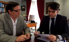 Mu��o y Calvo en la reuni�n.