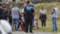 Imagen de los instantes posteriores a la pelea multitudinaria de este jueves entre dos grupos de feriantes en O Burgo (Culleredo).