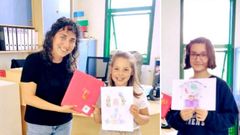 Entregan los premios del concurso de dibujo de las bibliotecas de Ames a sus dos vencedoras.