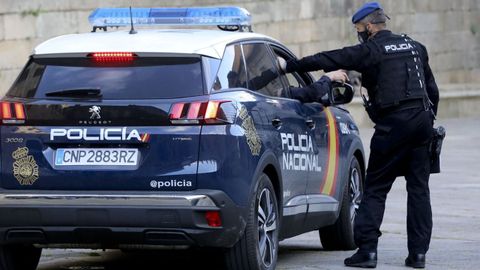 En una imagen de archivo, una patrulla de la Polica Nacional en Santiago