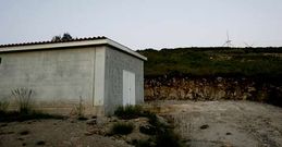 Dep�sito de agua y entorno donde deb�an haberse realizado obras que figuran en dos facturas.