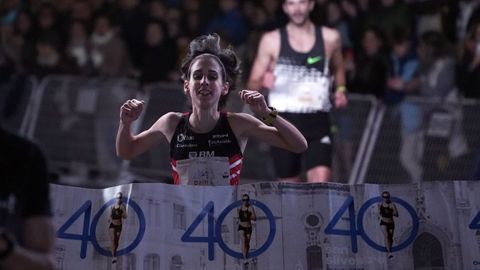 Paula del Bilbao y Rub�n Marqu�s, en la meta de la�San Silvestre de Oviedo