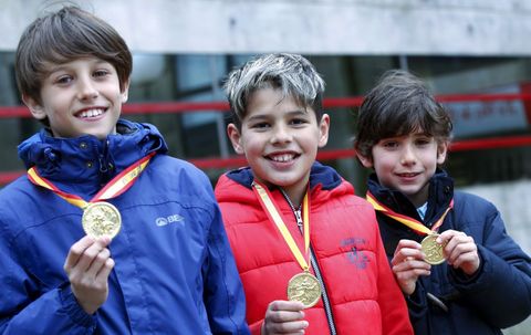 De izquierda a derecha, Jorge Oreiro, Ivn Varela y Hugo Torres, con sus medallas de oro. 