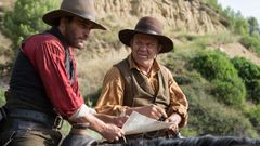 Joaquin Phoenix (izquierda) y John C. Reilly interpretan a los hermanos Sisters