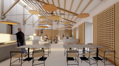 Espacio principal de la cafeter�a, con techo inclinado con vigas.