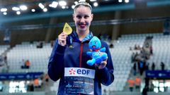 Iris Ti� posa con la medalla de oro de la prueba de solo t�cnico.