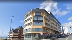Edificio de la localidad de Valdovi�o con pisos propiedad de la Sareb a la venta, en abril