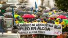 La marcha de los trabajadores de Alcoa, a su llegada a Oviedo, bajo una intensa lluvia