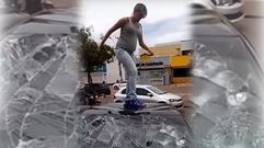 Una mujer embarazada destroza el coche de su marido infiel