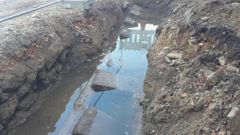 Restos del antiguo lavadero de finales del siglo XIX descubierto en las obras de la R�a da Santi�a, en Pontevedra