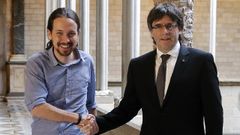 Iglesias y Puigdemont en una foto de archivo