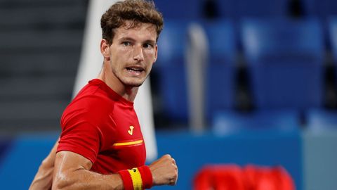 El espa�ol Pablo Carre�o celebra un punto ante el ruso Daniil Medvedev