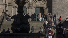 Turistas haciendo cola para acceder a la catedral de Santiago, en la praza das Prater�as, en una imagen de archivo. 